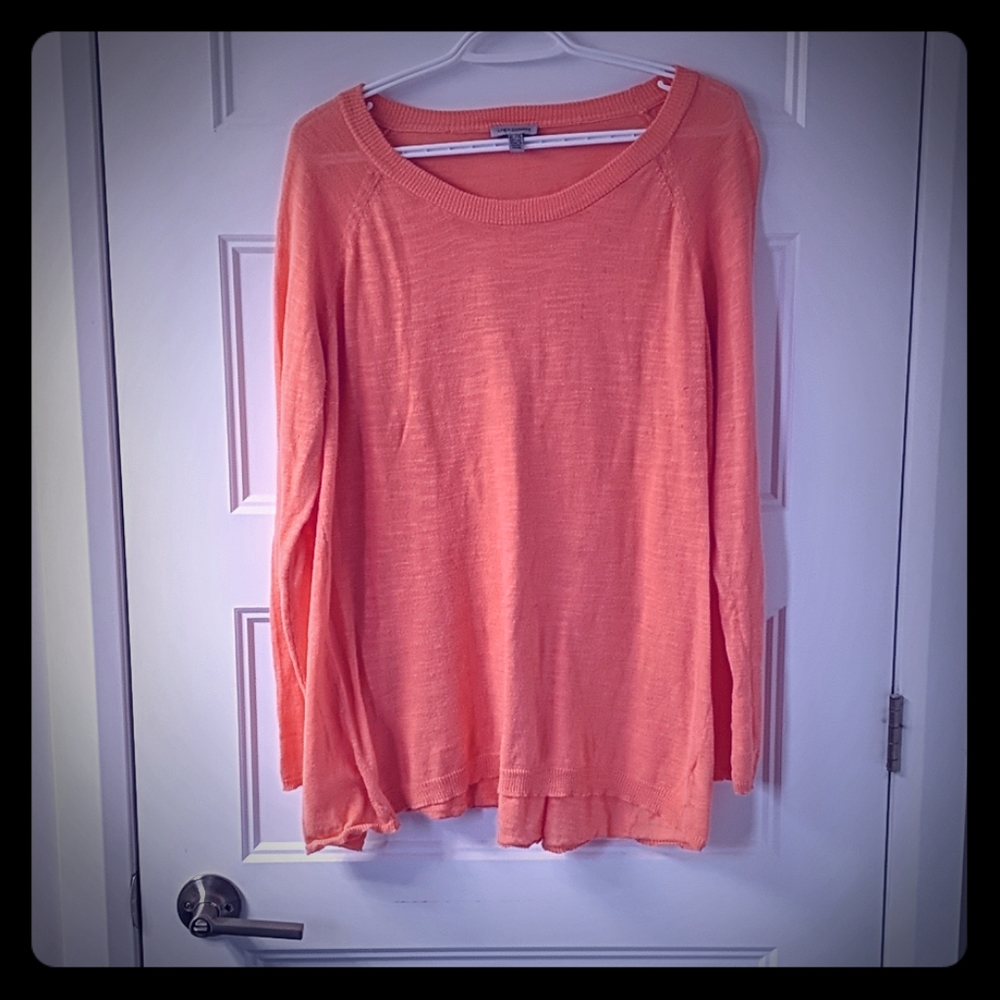 Light orange sweater